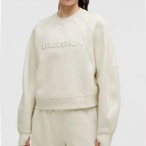 Lululemon Scuba Oversized Pullover Wordmark color Bone M/L  New w/Tags
